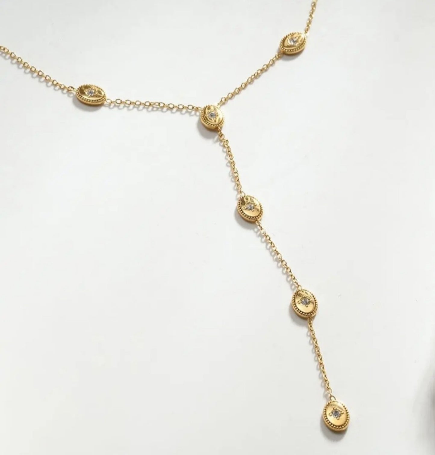 Collier Y à médaillons sertis