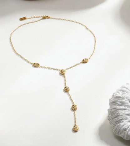 Collier Y à médaillons sertis