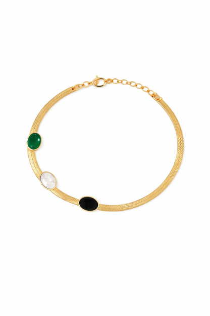 Pulsera de oro con piedras ovaladas