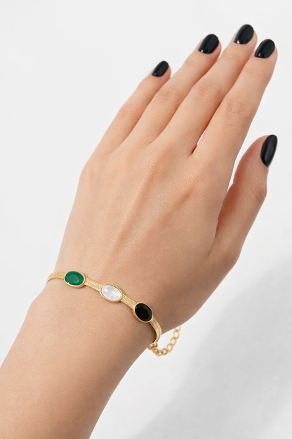 Pulsera de oro con piedras ovaladas