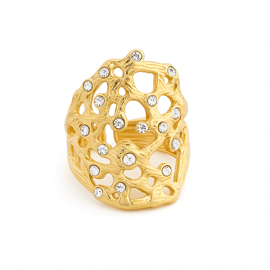 Bague dorée ajourée à strass