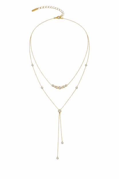 Collar dorado en forma de Y con piedras brillantes