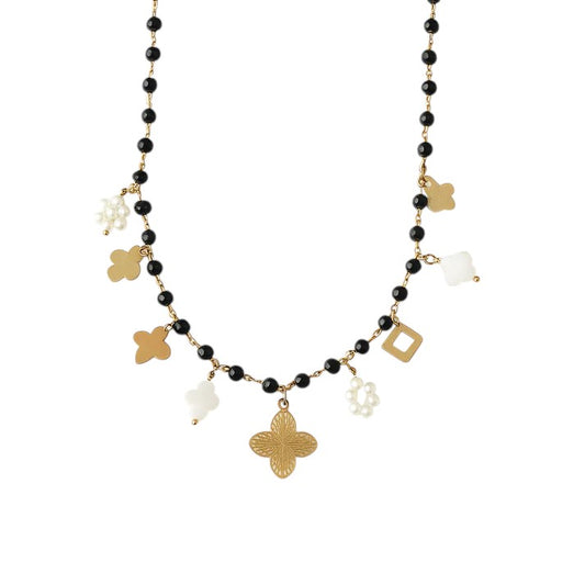 Collar de oro con perlas y tréboles