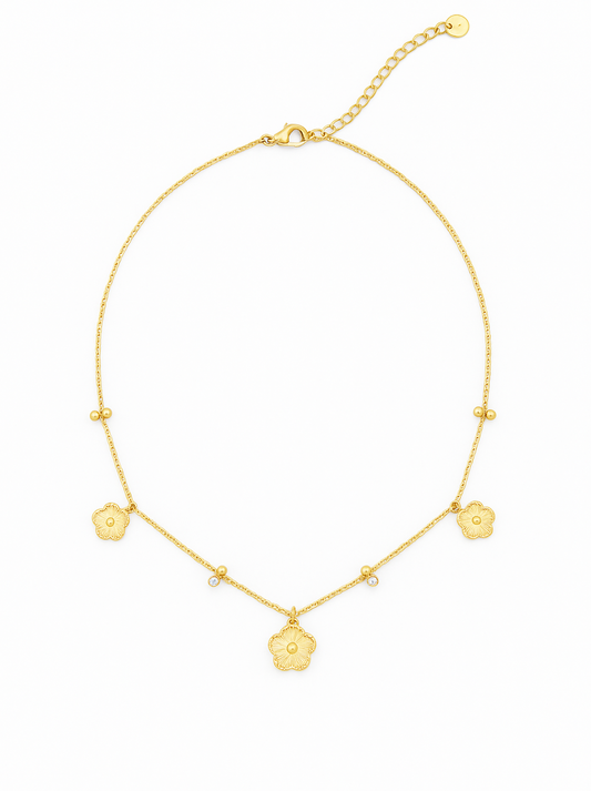 Collier doré fleurs et zircons